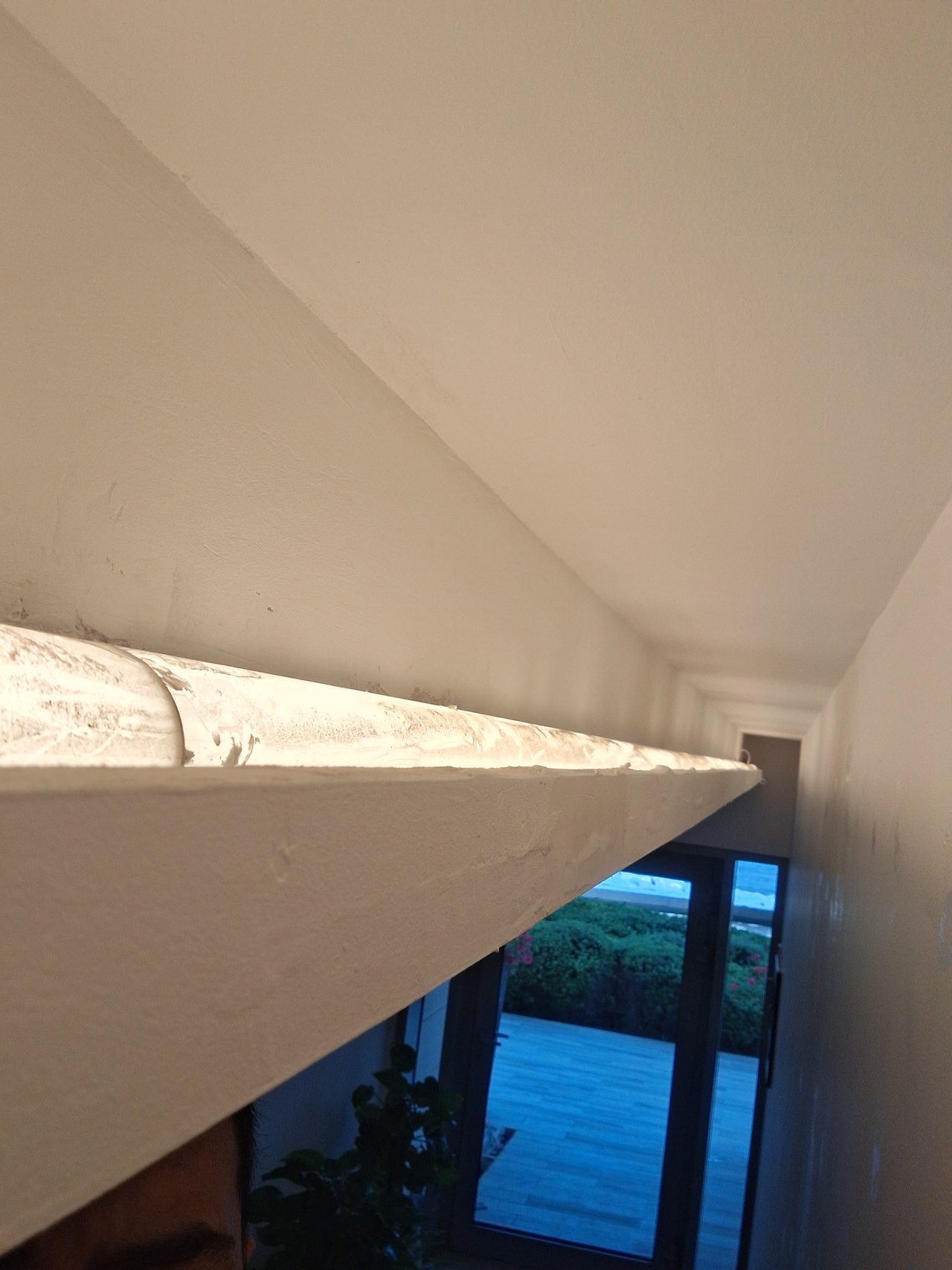 Finished ceiling niche with soft illumination, requiring high precision finishing