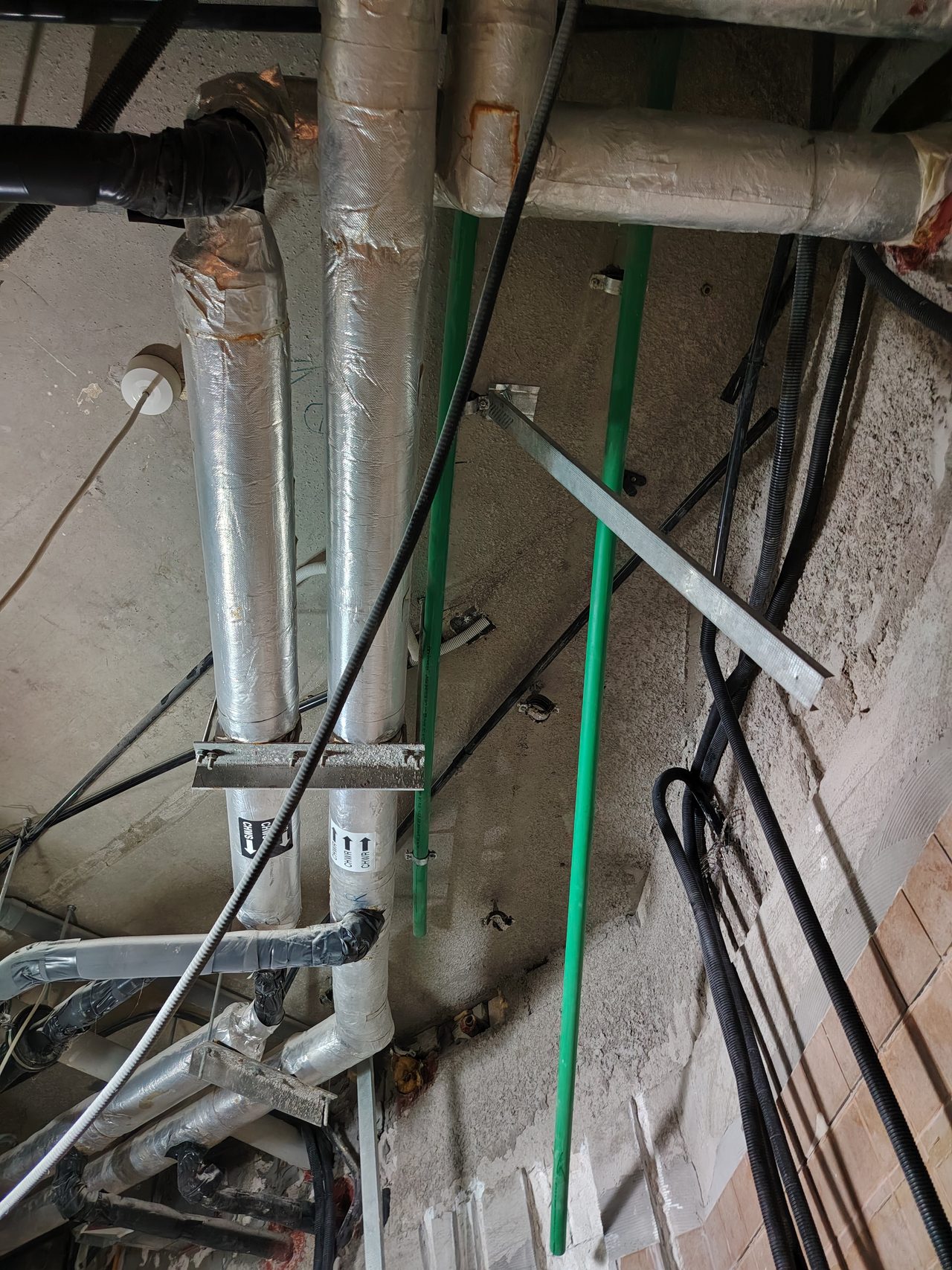 Installation of modern polymer water supply pipes replacing outdated metal risers
