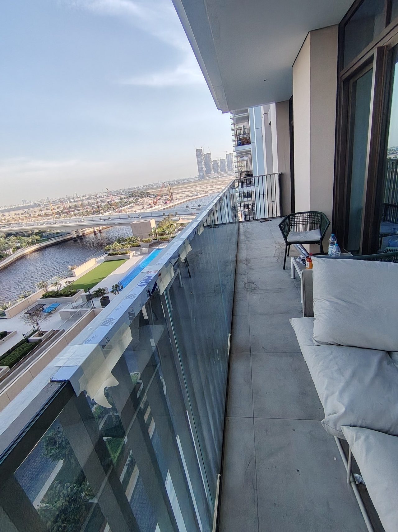 View of the panoramic balcony glazing and the surrounding cityscape